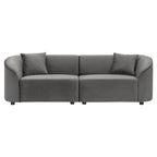 Gebogenes Zweisitzersofa mit abgerundeter Rückenlehne