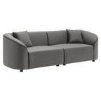 Gebogenes Zweisitzersofa mit abgerundeter Rückenlehne