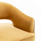 Fauteuil tonneau pivotant en velours avec dossier capitonné