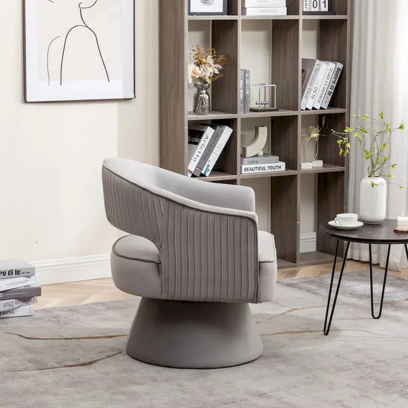 Fauteuil tonneau pivotant en velours avec dossier capitonné