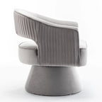 Fauteuil tonneau pivotant en velours avec dossier capitonné