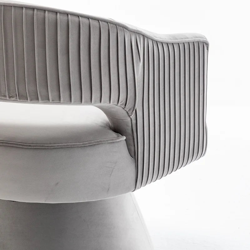 Fauteuil tonneau pivotant en velours avec dossier capitonné