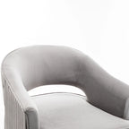 Fauteuil tonneau pivotant en velours avec dossier capitonné