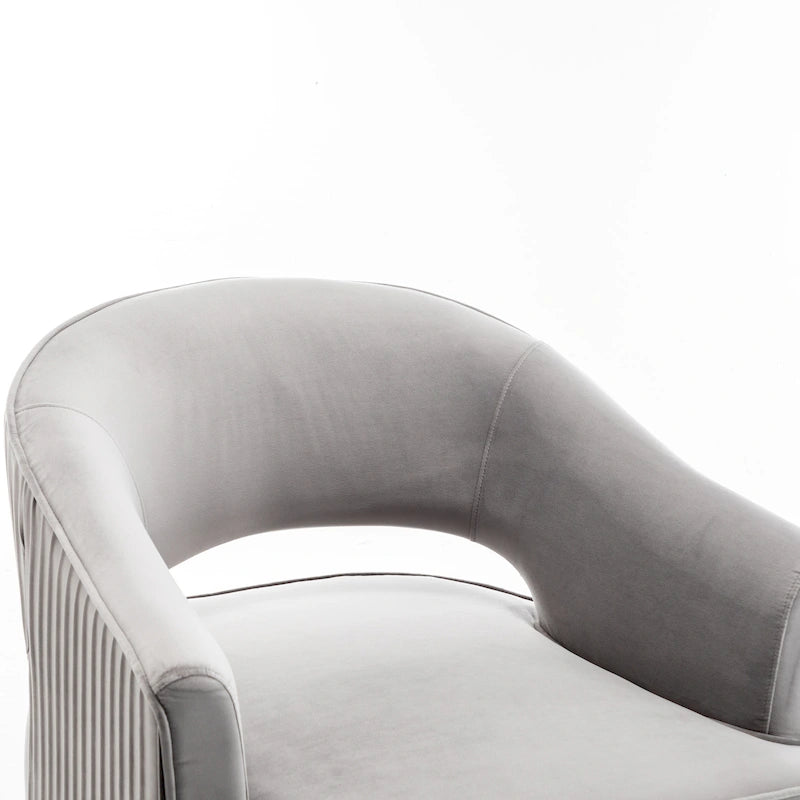 Fauteuil tonneau pivotant en velours avec dossier capitonné