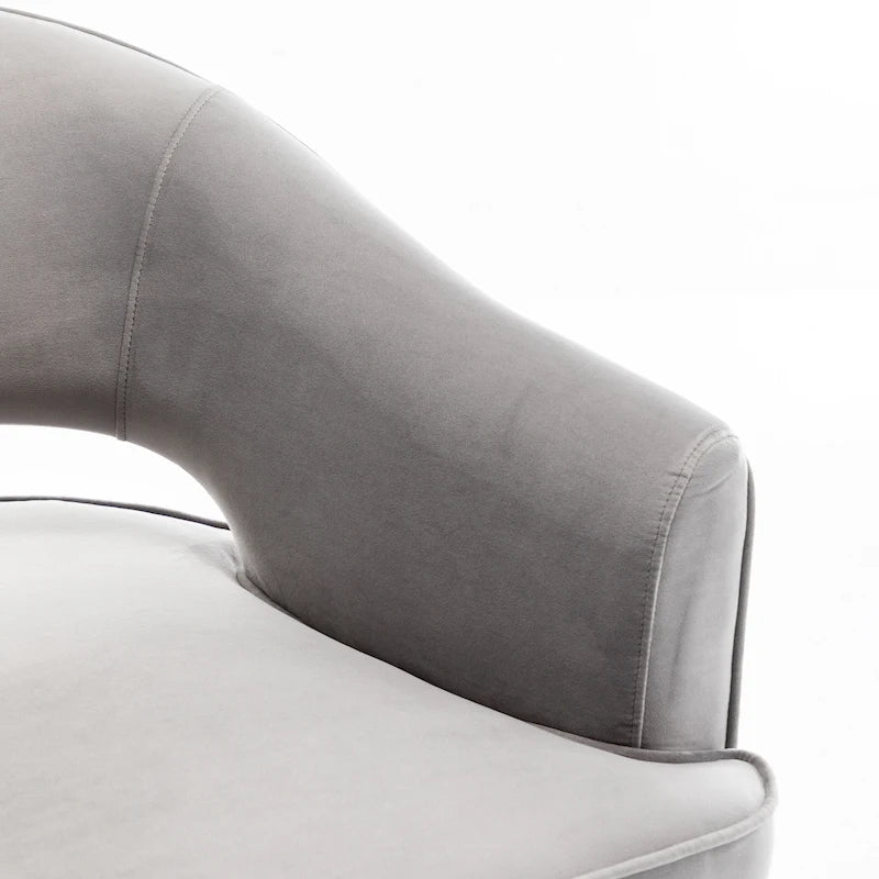 Fauteuil tonneau pivotant en velours avec dossier capitonné