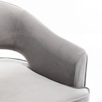 Fauteuil tonneau pivotant en velours avec dossier capitonné