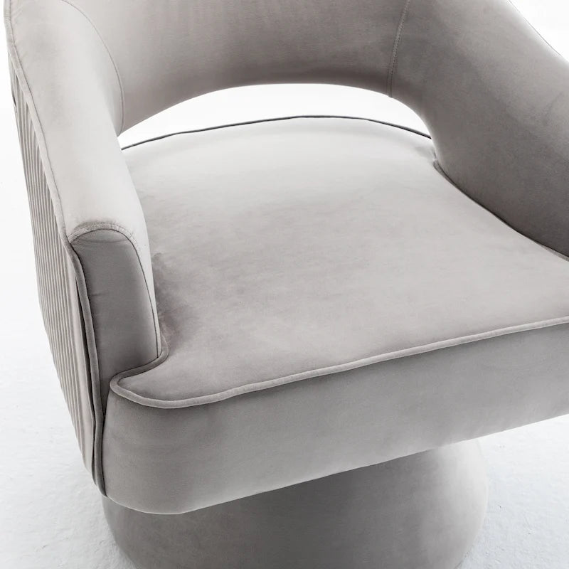 Fauteuil tonneau pivotant en velours avec dossier capitonné