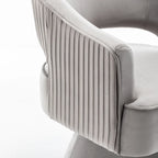 Fauteuil tonneau pivotant en velours avec dossier capitonné