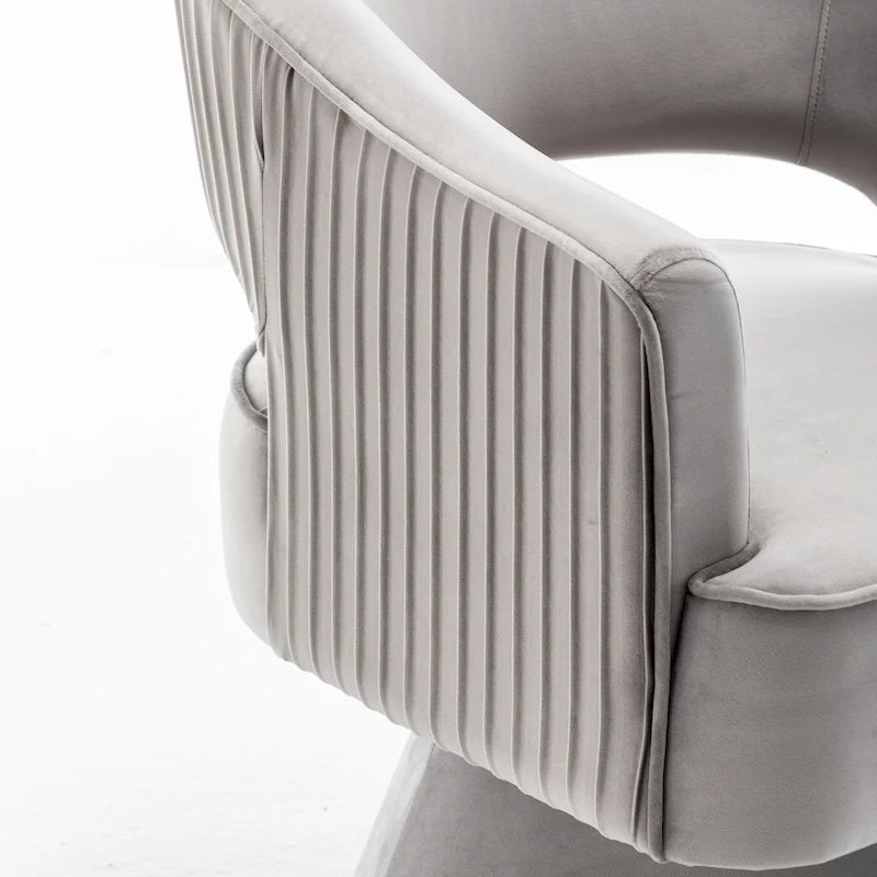 Fauteuil tonneau pivotant en velours avec dossier capitonné