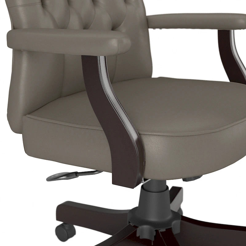 Fauteuil de bureau capitonné à dossier haut avec accoudoirs